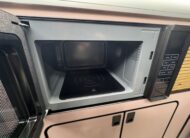 Volkswagen T6.1 Campervan Trek Edition – Coral Pink Cabinetry (Storm)